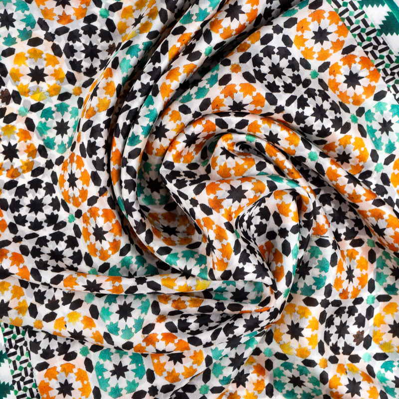 Silk scarf fabric with orange and green pattern inspired by Islamic art