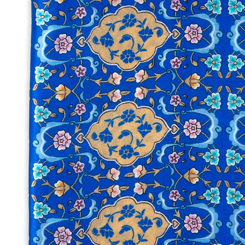 Detail of blue and brown silk scarf with turkish floral print