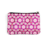 Small leather purse with pink print inspired by Islamic art