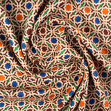 Detail of modal scarf with colorful print inspired by Andalusian tiles