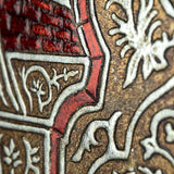 Detail of hand painted leather work