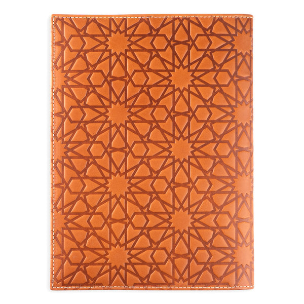Brown leather journal featuring embossed islamic art design