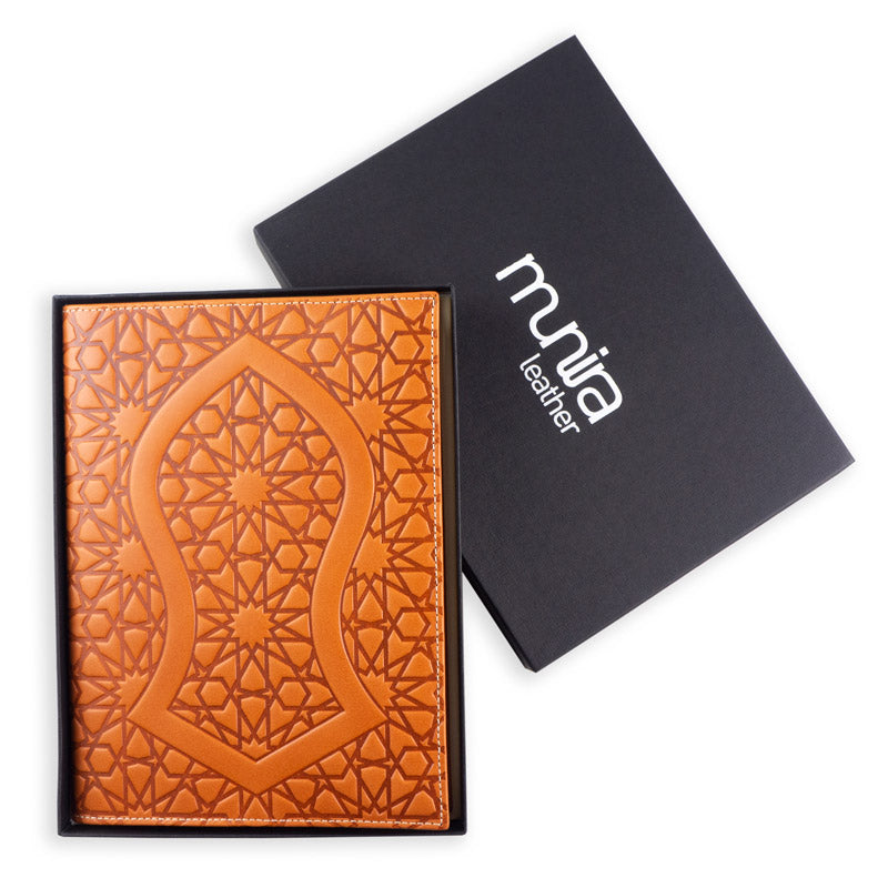 Brown leather journal with islamic art pattern embossed and black box