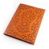 Brown leather journal featuring nalayn embossed design
