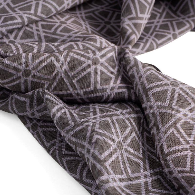Black and gray scarf detail with islamic art inspired print