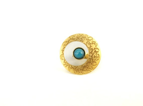Islamic art inspired gold ring with blue stone