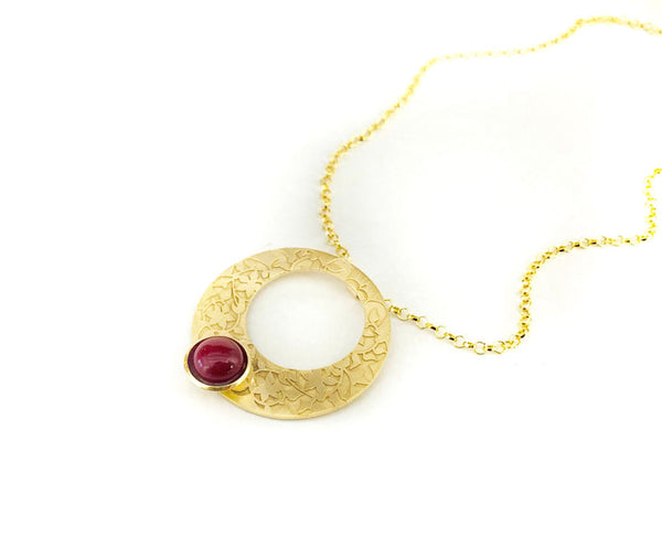 Islamic art inspired gold circle pendant for women with red stone