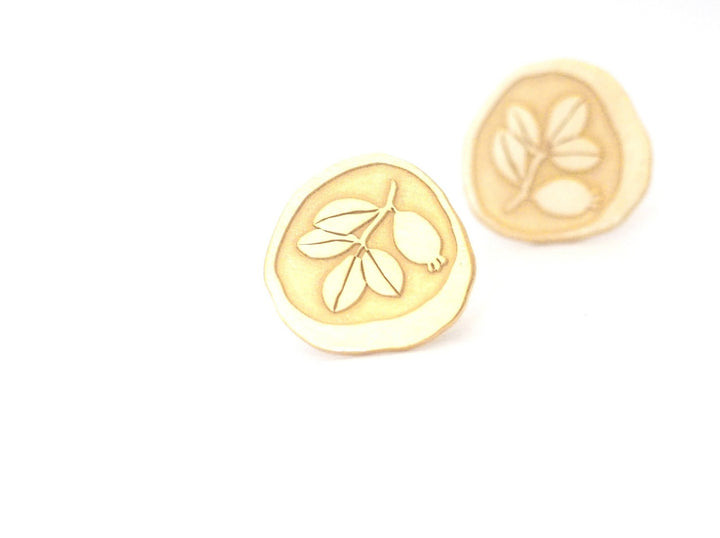 Gold plated earrings with floral motifs engraved