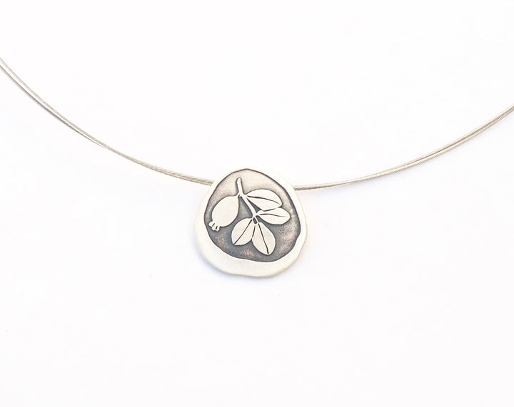 Silver necklace with floral engraved inspired by Alhambra mosaic tiles