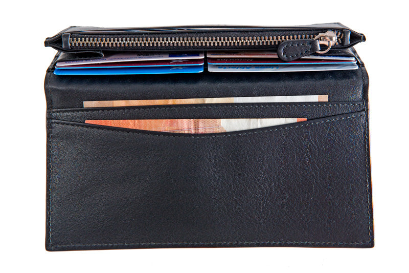 Inside pockets for credit cards and bills of black leather wallet