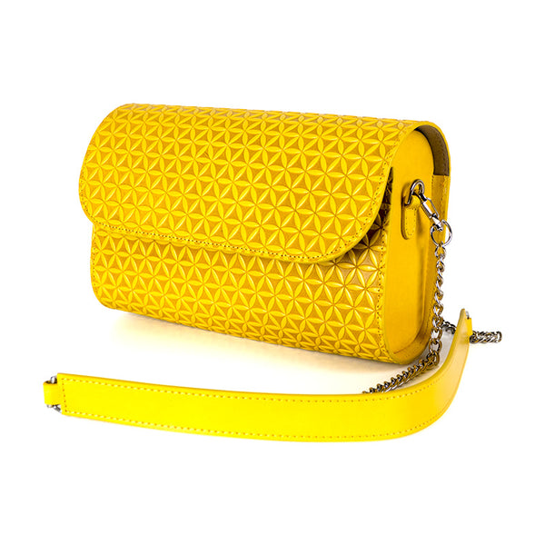 Small leather bag with metal and leather strap in yellow color with flower of life pattern