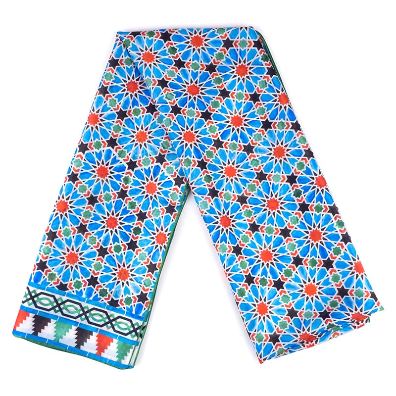 Blue and red silk scarf with geometric print inspired by moroccan mosaic tiles