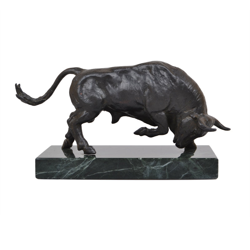 Charging bull sculpture with marble base