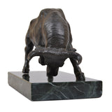Bronze bull sculpture with dark marble base