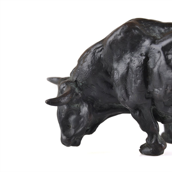 Detail of bronze grazing bull sculpture