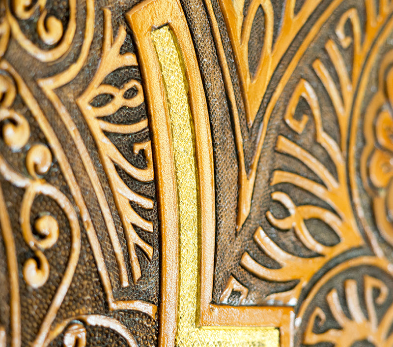 Close up of embossed and tooled leather inspired by Islamic art patterns