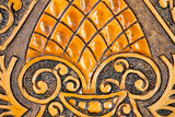 Detail of embossed leather art paint