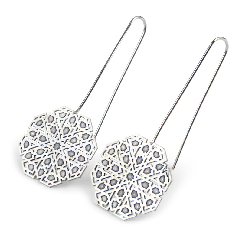 Long drop earrings inspired by Islamic art geometry