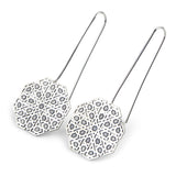 Long drop earrings inspired by Islamic art geometry